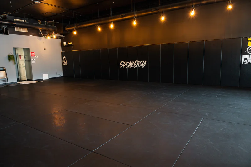 The mats and padded walls at Speak Easy Jiu Jitsu